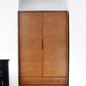 brown wooden 2-door cabinet